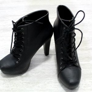High heeled lace up shoes